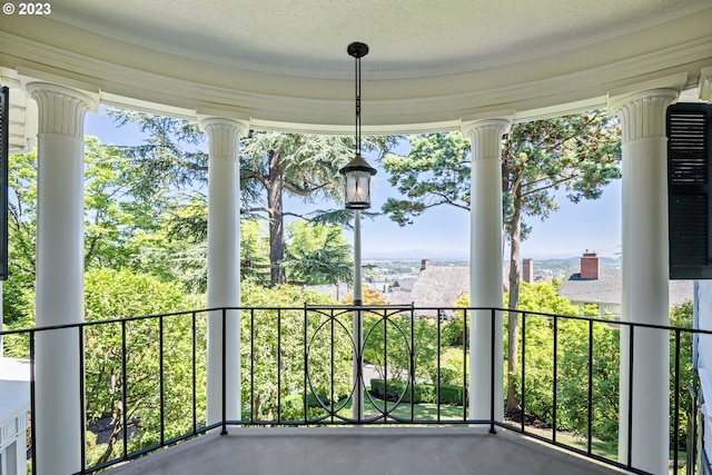 unfurnished sunroom featuring a wealth of natural light