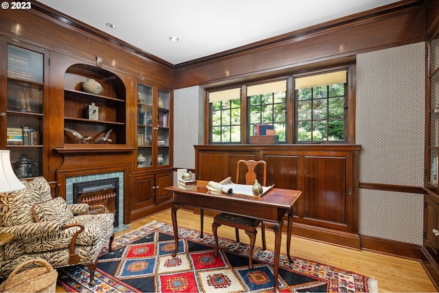 office space with crown molding and hardwood / wood-style floors