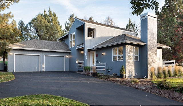 view of front of property with a garage