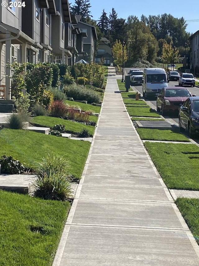 surrounding community featuring a lawn