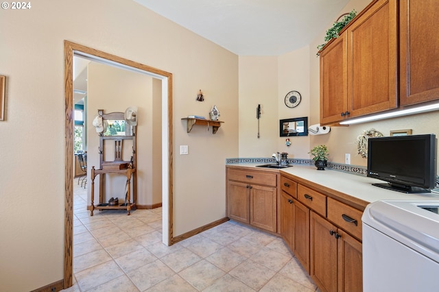 kitchen with sink and light tile patterned floors