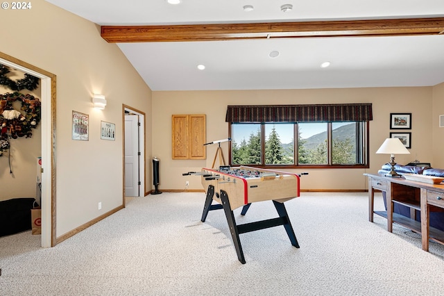 rec room featuring vaulted ceiling with beams and light carpet