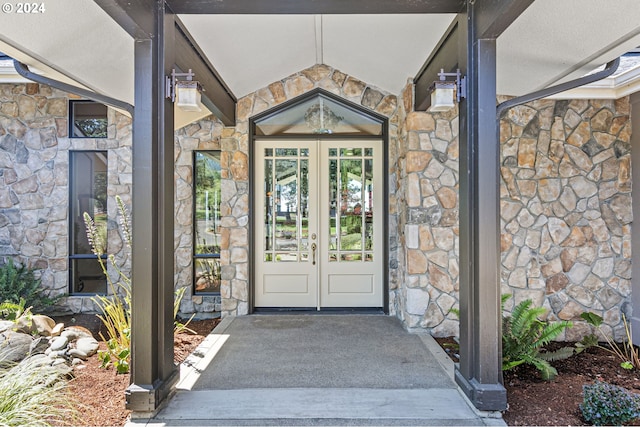 view of exterior entry featuring french doors