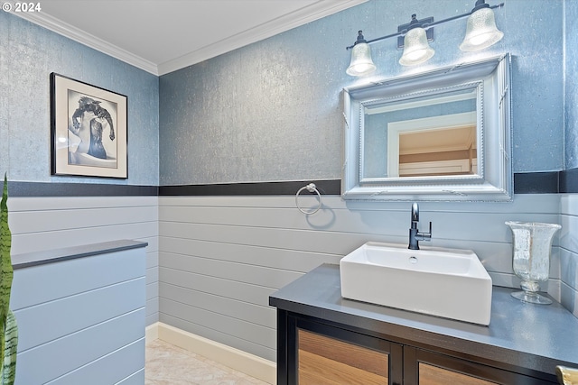 bathroom featuring vanity and ornamental molding