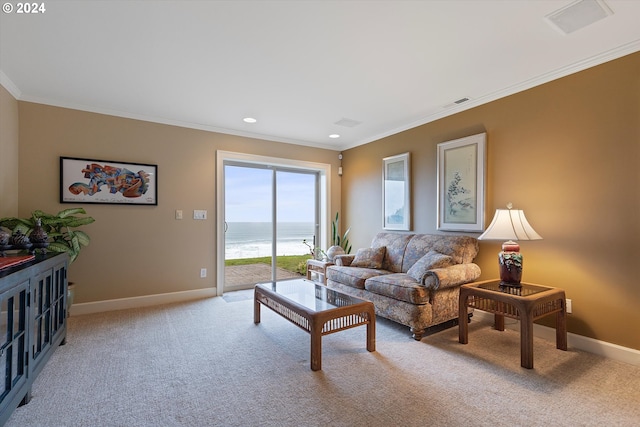 living room featuring crown molding, a water view, and light carpet