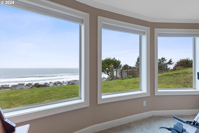 interior space featuring a water view and a healthy amount of sunlight