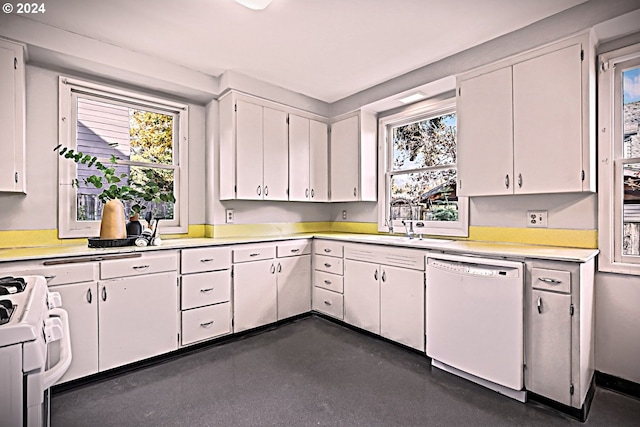 kitchen with white cabinets, white appliances, and sink