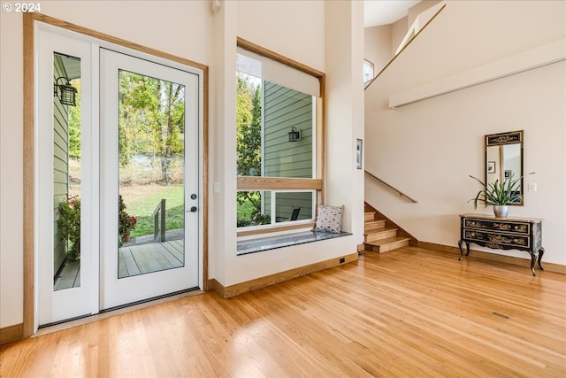 doorway to outside with hardwood / wood-style floors