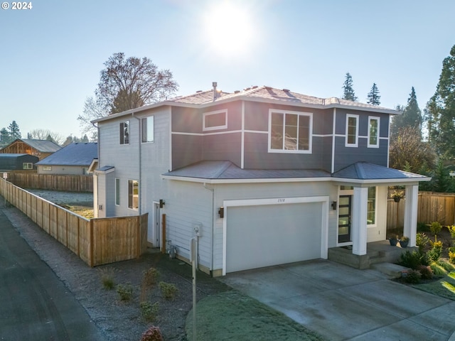 view of front of home with a garage