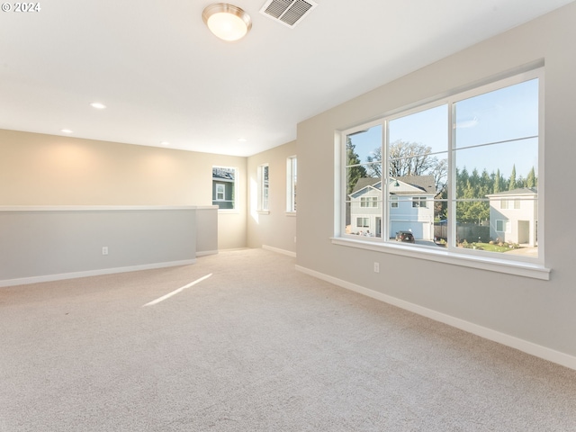 view of carpeted spare room