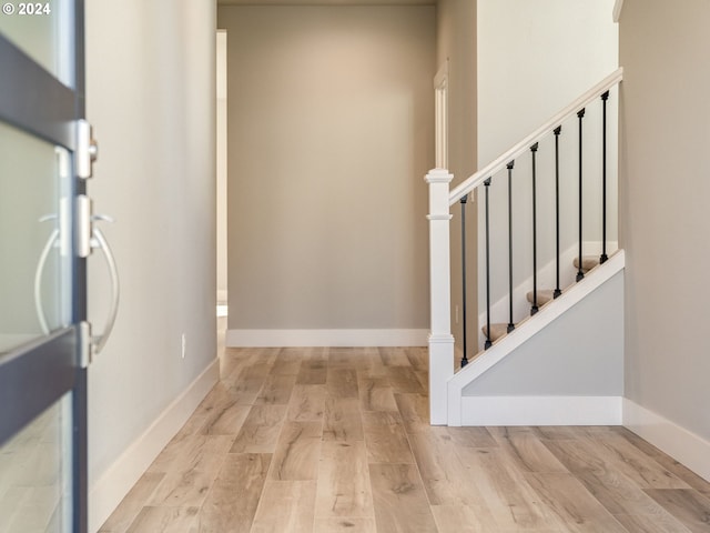 foyer entrance featuring light wood-type flooring