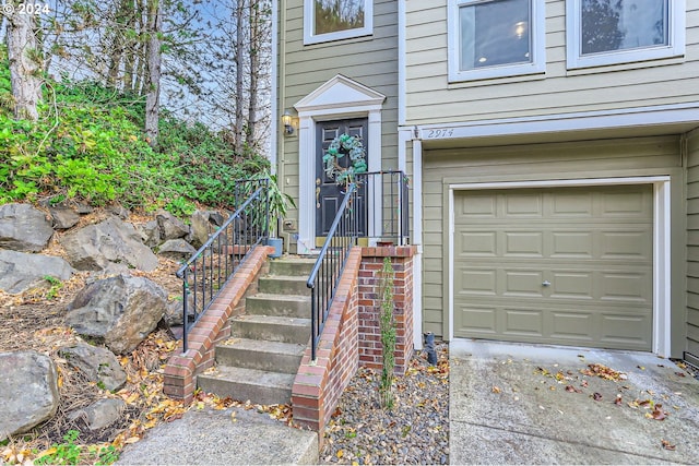 property entrance with a garage