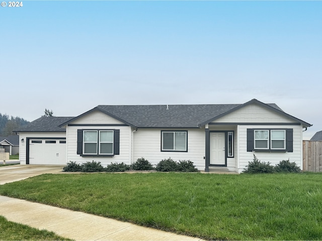 ranch-style house with a front lawn and a garage