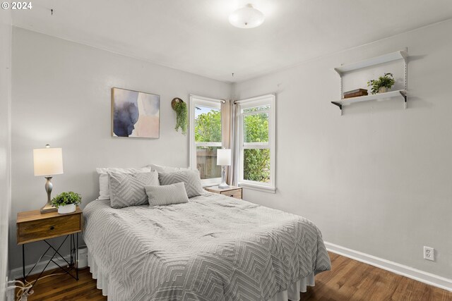 bedroom featuring dark hardwood / wood-style floors