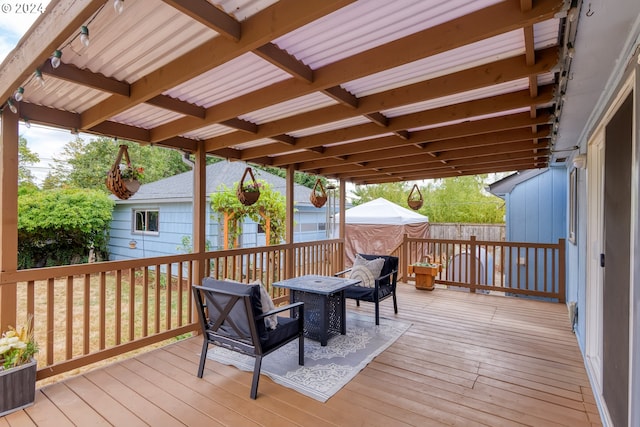 wooden deck with a shed