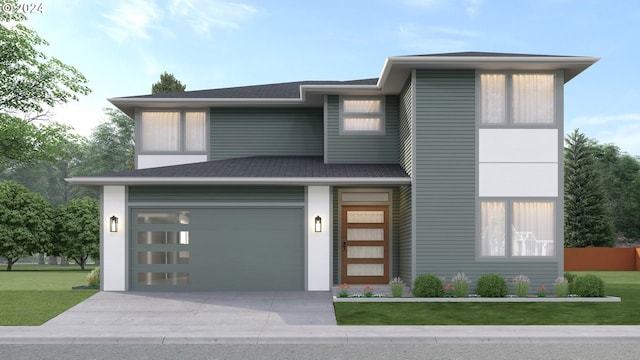 view of front facade with a garage and a front yard