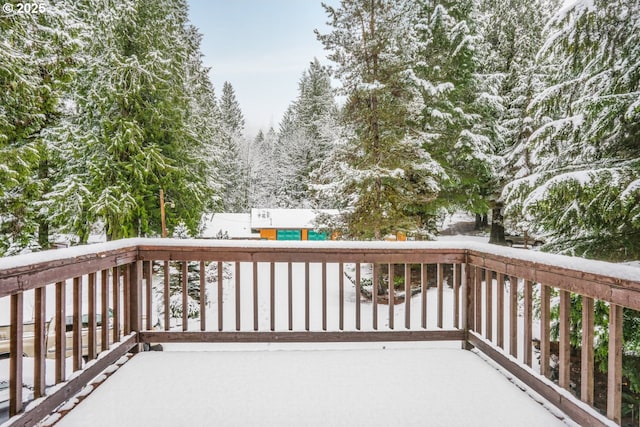 view of snow covered deck