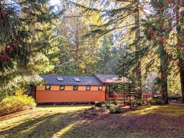 exterior space with a view of trees