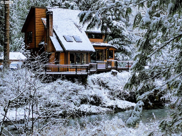 view of front of house with a deck