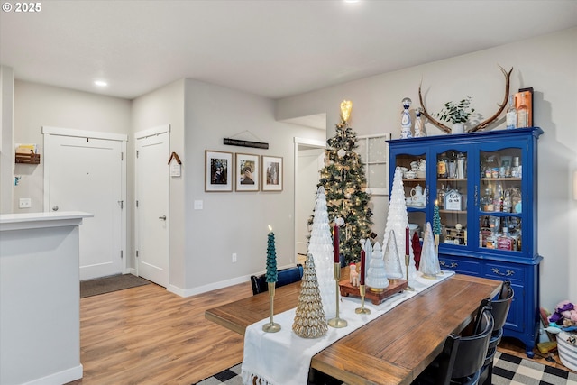 dining room featuring light hardwood / wood-style flooring