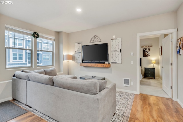 living room featuring light wood-type flooring