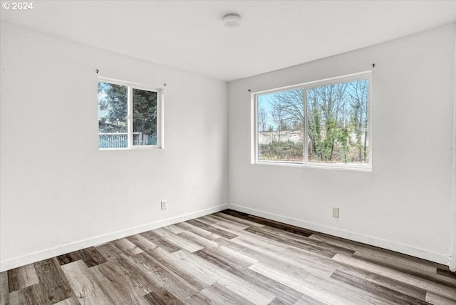 empty room featuring light hardwood / wood-style floors