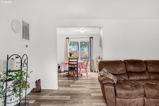 living room featuring light wood-type flooring