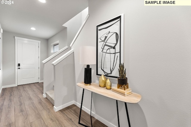 hallway featuring light hardwood / wood-style floors