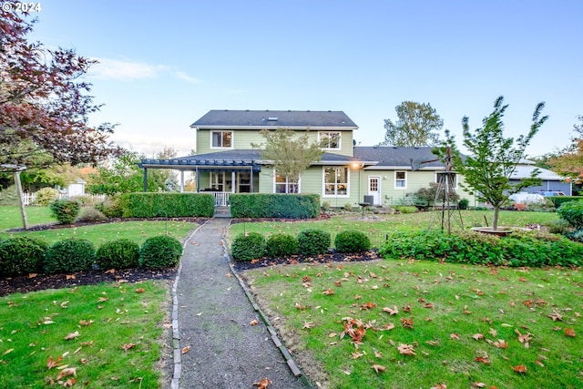 view of front of home with a front lawn