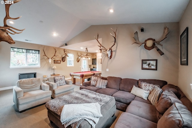 carpeted living room with pool table and vaulted ceiling