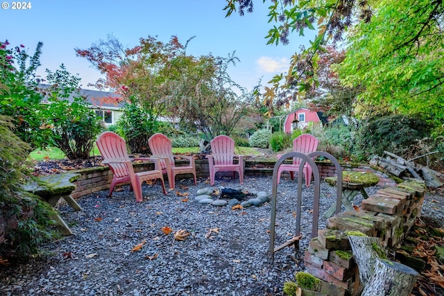 view of patio featuring a fire pit