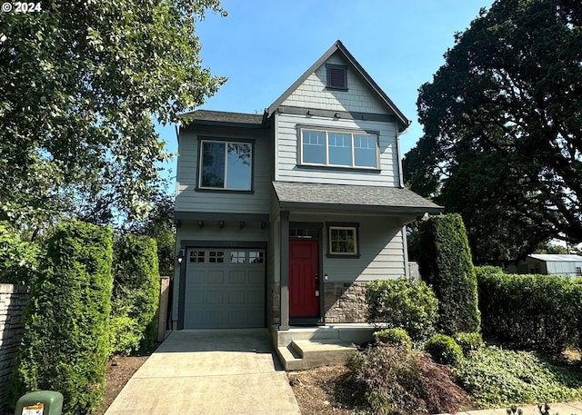 craftsman-style home with a garage