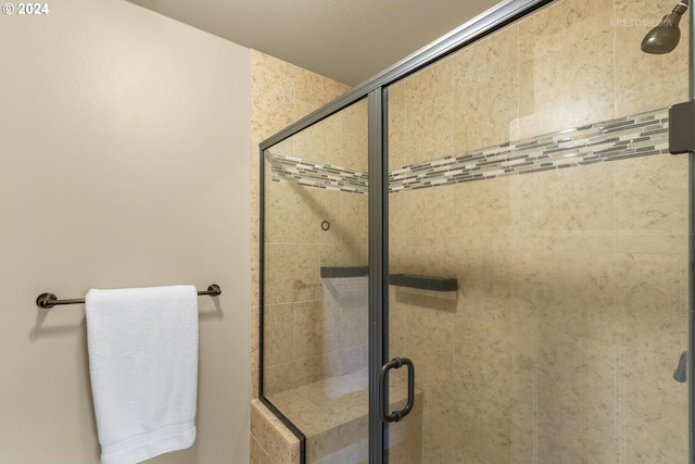 bathroom featuring walk in shower