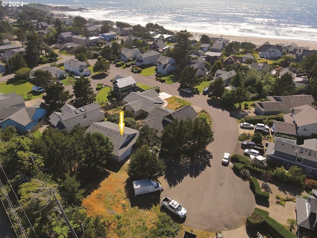 aerial view featuring a beach view and a water view