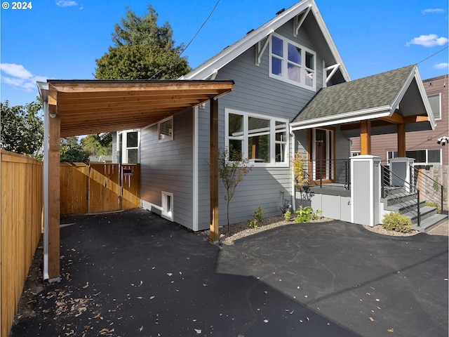 view of front facade featuring a carport