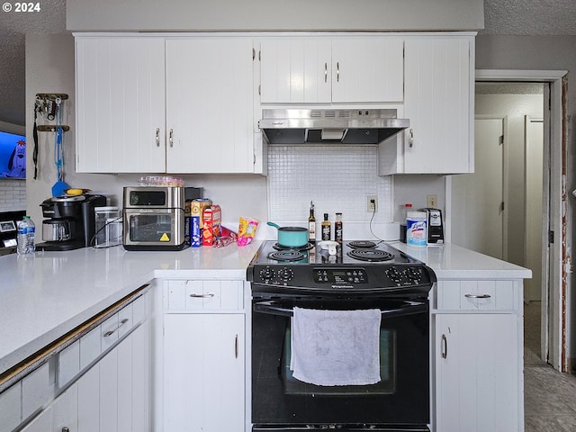 kitchen featuring white cabinets, a textured ceiling, tile flooring, wall chimney exhaust hood, and black range with electric stovetop