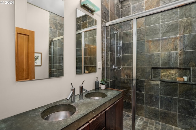 bathroom with vanity and an enclosed shower