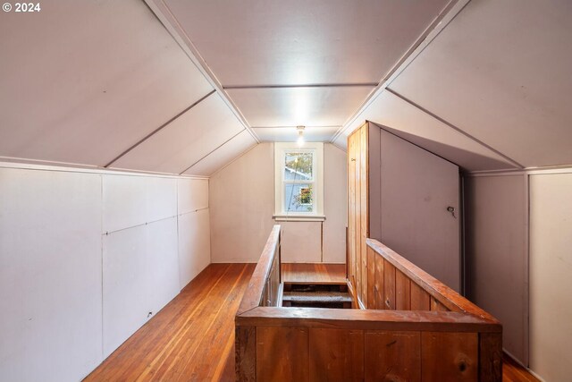 carpeted bedroom featuring ceiling fan, a closet, and ornamental molding