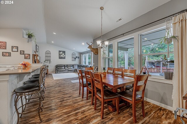 1843 Shelley Rd, Coquille, OR 97423 - dining space featuring dark wood-style flooring, lofted ceiling, a chandelier, recessed lighting, and baseboards