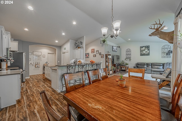 1843 Shelley Rd, Coquille, OR 97423 - dining room with vaulted ceiling, arched walkways, dark wood finished floors, recessed lighting, and baseboards