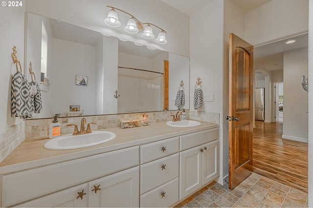 1843 Shelley Rd, Coquille, OR 97423 - bathroom with double vanity, tasteful backsplash, and a shower