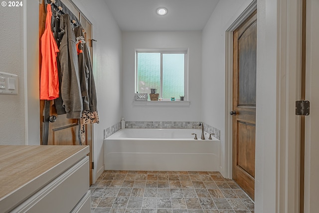 1843 Shelley Rd, Coquille, OR 97423 - full bathroom with a garden tub and stone finish flooring