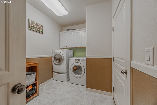 1843 Shelley Rd, Coquille, OR 97423 - washroom with separate washer and dryer, cabinet space, and baseboards