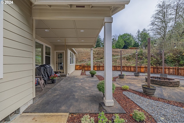 1843 Shelley Rd, Coquille, OR 97423 - fenced backyard with an outdoor fire pit and a patio area