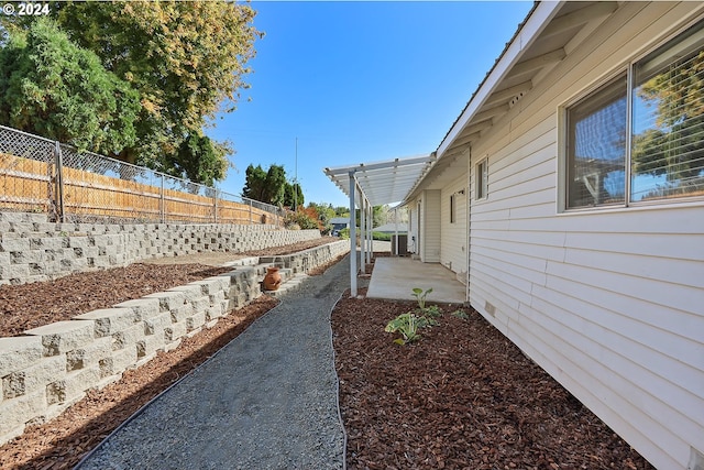 view of yard with a patio area and a pergola