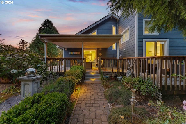 view of front of home with a deck