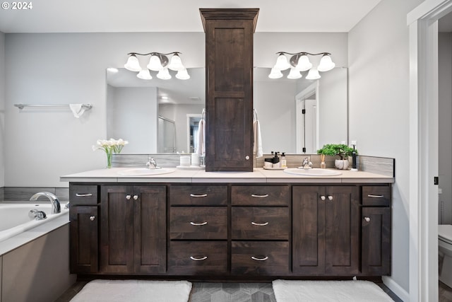 full bathroom with separate shower and tub, vanity, and toilet