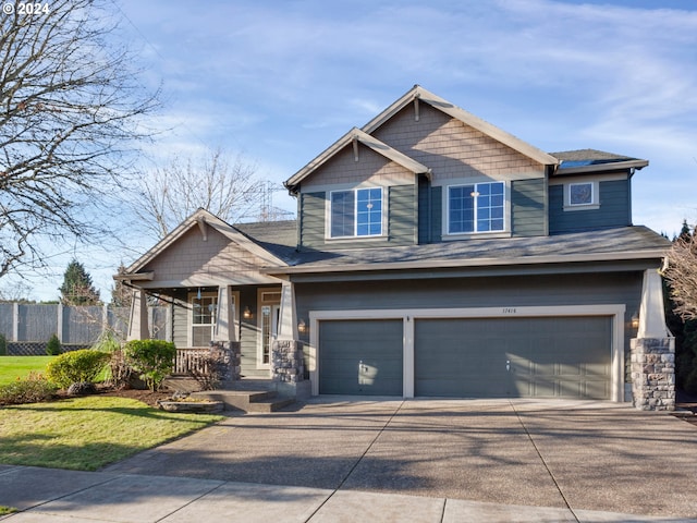 craftsman inspired home featuring a garage