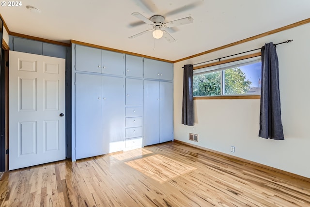 unfurnished bedroom with ceiling fan, a closet, and light hardwood / wood-style flooring