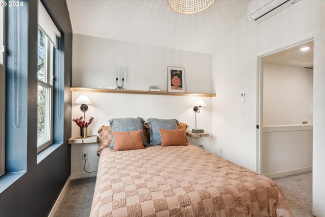 carpeted bedroom featuring a wall mounted air conditioner